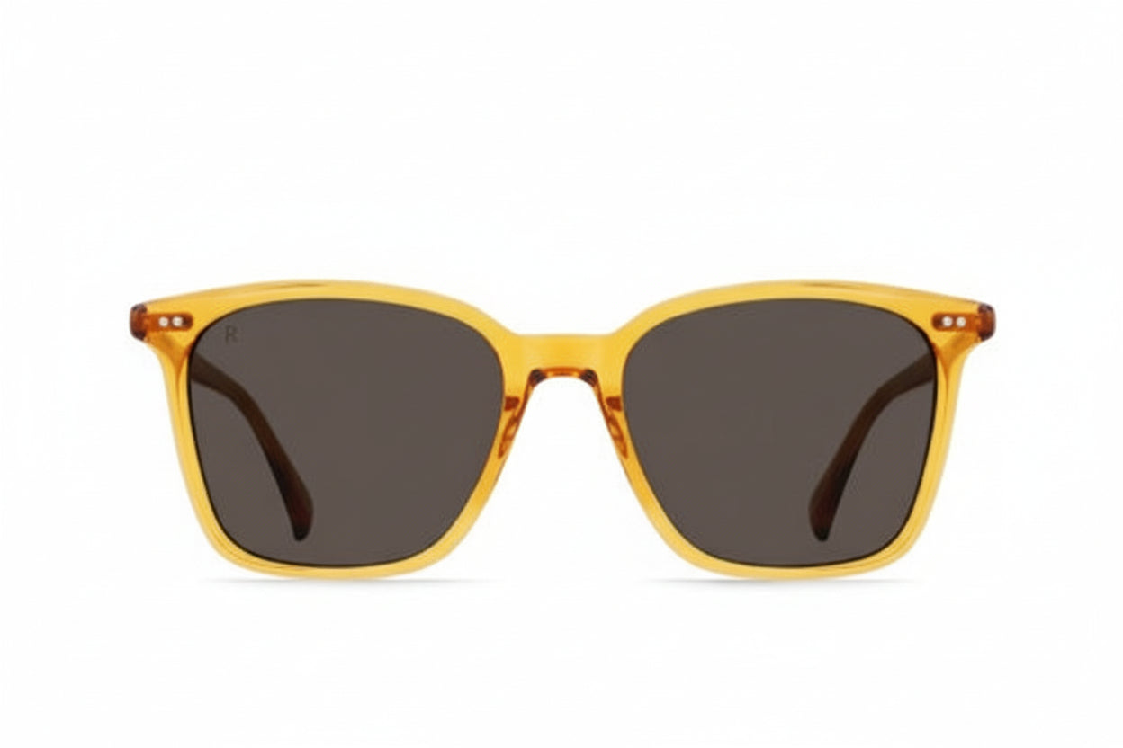 Yellow sunglasses with dark lenses on a white background